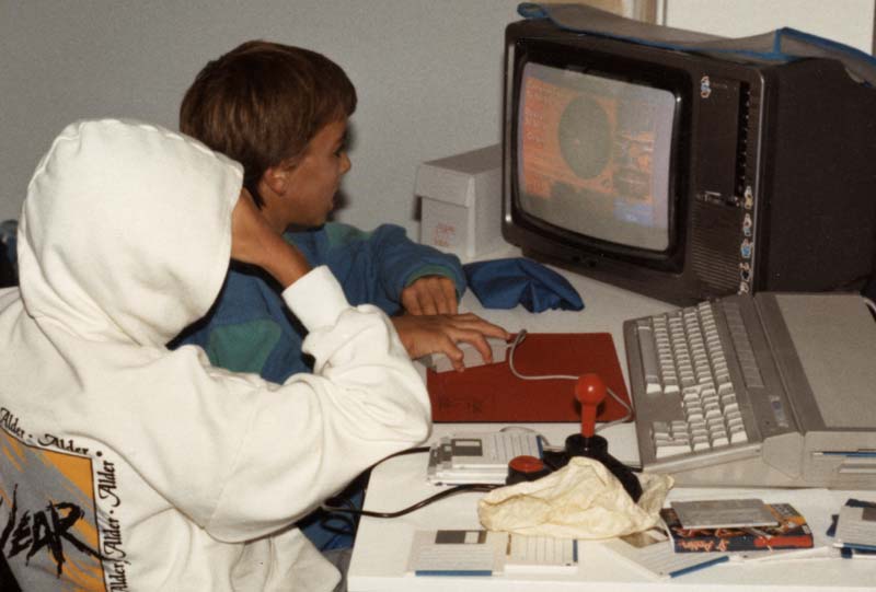 Image showing Paulie and his brother playing the Atari ST